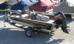 2003 Crestliner Fishhawk 1750 with a Mercury 115hp EFI 4-stroke engine, custom trailer, optional dual consoles, two fish locators, 24 volt trolling motor, on-board battery charger, custom boat cover, stainless propeller, spare tire, and more. Boat is