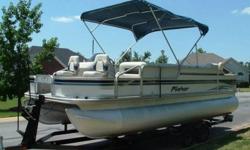2003 Fisher 22 FT Deluxe Fish pontoon boat equipped with a 2003 Honda 90 HP Four Stroke engine and matching tandem trailer. This is a very clean boat that offers the versatility of cruising, tubing, skiing or fishing. The interior is really sharp with all