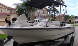 2004 Boston Whaler 160 Dauntless.Mercury 115 HP 4 Stroke EFI @100 hrs.Ez Loader Boat Trailer with swing tongue.Minn Kota Riptide Trolling Motor.Lorance HDS7.Clariion Radio.Live Well.Extra Fishing chairs, front and rear anchors, mooring ropes,