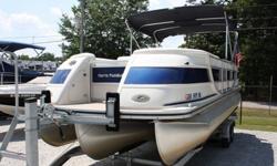 Just in this morning, not even washed in the pics below. Gorgeous, absolutely loaded 2004 Harris 240 Crowne Tritoon for sale!! In 2004 the Crowne was the pinnacle of the Harris line. This boat has it all including , CD stereo, rear sunpad, full