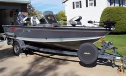 2004 Lund Mr.Pike with 115hp Yamaha 4stroke and trail master trailer. Duel live wells/bait tank. Plenty of storage with rod locker. 24V MinnKota 65lb thrust foot controlled Trolling motor. Duel Fish Finders, Eagle 320c at bow and Hummingbird at driver