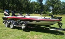 This 2004 Ranger Commanche 521VX bass boat is in like-new condition. It's fully equipped with a 250hp Evinrude motor with low, low hours and a stainless steel prop, 101 lb. thrust Minn Kota trolling motor with recessed foot control, two (2) Garmin
