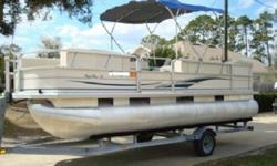 NEW wraparound console w/tinted, removable windscreen & ergonomically positioned binnacle control box Port & starboard bow couches w/underseat storage & drink holders Full-width swim platform with a non-skid surface and boarding ladder Adjustable helm