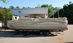 This boat just came in and has not even been washed yet!!! It is a one owner boat that we took in on trade. It is in fantastic condition inside and out and loaded with all the cool options you want in a pontoon boat. The interior looks NEW, the carpet