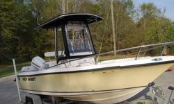 Strong, Reliable and Clean... Center console boat, trailer and 150 HP Johnson/Bombardier motor with every possible factory option; including 2 Batteries, 2 Jump-seats, Sun Pad, 2 Built-in coolers, Raw water wash down, Sunbrella T-top, Rain/Spray