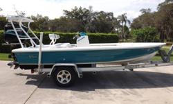 CUSTOM 2006 V-TECH Flats PRO Series 18 Ft. boat powered by a 2002 MERCURY 225 EFI 2 stroke motor, Mercury Bravo 1, 24 pitch stainless prop. Only 890 hours. The motor runs very strong and sounds intimidating! This boat is not for the faint of heart, she