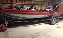 Very nice and clean bass tracker pro team 175. 50 hp mercury 2 stroke engine. Motor guide trolling motor. On board charger. Live well. Lowrance fish finder. Power tilt and trim. Carpet is in great shape and seats have no tears rips or holes. Tracker
