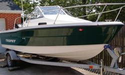 ONLY 5 HOURS!!!This boat was purchased NEW in April 2006. It has less than 5 hours on it... that's right, only 5 hours!!!! For all intents and purpose, this boat is as close to BRAND NEW as it gets! Karavan galvanized trailer with brakes (just redone).
