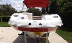 maintained hours, bow boarding ladder, bow ice cooler, bow seating, bimini top, docking lights, helm wet bar, porta potti, wrap around helm & aft seating, side gate gate & walk thru transom for ease of boarding, complete with tandem axle trailer....