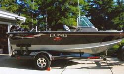 2006 Lund 1800 Sport Angler, 18 ft 5 in, 97in beam, custom storage and rod lockers for this model, wash down station w / SS sink, 6 Lund premium seats 2 with air ride features, Three never sat on, On board 3 bank 10 amp ea. Pro charger 12 & 24 volt