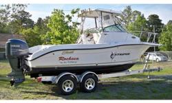 2006 SEASWIRL 2301, Barely used (around 100 hrs) like-new boat.Double forward V-berth with storage all around. Yamaha 250 4-stroke that fires up every time without fail and runs like a dream. I take this boat offshore and a 38-mile round-trip and trolling