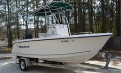 The 2006 Trophy 1903 cc Center Console Boat 19? is great for salt water and fresh water use. This model is loaded with upgraded features to enjoy the best water experience you deserve. I will include the Lowrance Fish finder/GPS/depth indicator, Sony