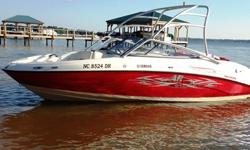 The 21-foot AR210 was completely new for 2006, and was made for showing off. With 220-horsepower, twin four-stroke engines (~150 hours), comfortable seating for nine, and an aluminum wakeboard tower, this boat has everything you need for a day of
