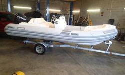 2008 Caribe DL15 Inflatable boat with 60 hp Evinrude engine. The boat runs great. The boat sustained storm damage to the boat. The engine cover on the engine is busted, but is above water level could use as is if you ;ike. The rear seat is ripped, the