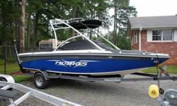 Sorry I do not have interior pics right now but will post them as soon as this rain stops if the boat is still available. This 2008 Moomba Mobius LSV is 21.5 feet long and is an easy "9" on a scale of 1-10. It hasn't even been washed in the pics below!