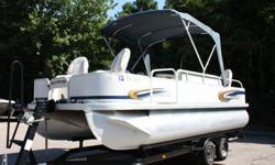 This boat is in excellent condition and loaded with all the cool options anyone could want for a great day at the lake either fishing, hanging out or doing watersports!! This pontoon boat comes complete with huge bimini top, Captain's helm chair, CD
