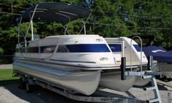 Gorgeous, absolutely loaded 2009 Harris 250 Crowne Tritoon for sale!! In 2009 the Crowne was the pinnacle of the Harris line. This boat has it all including , incredible stereo, rear sunpad, full instrumentation, full size Captain's helm seat, pop up