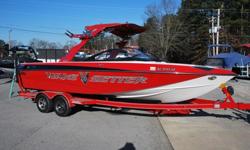 Ultra clean, one owner, LOADED 2009 Malibu 25' 247 LSV Wakesetter Wakeboard and Wakesurf Boat for sale. This boat is in amazing condition inside and out comes LOADED with a full pull over mooring cover, Stainless Steel Power Wedge, custom stainless