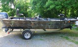 2010 G3 1860 SC in Camo with Yamaha 60 HP 4 Stroke. Options include Minn Kota Edge 24 vt 70 lb trolling motor, dual pro battery charger, camo gear box for storage, 4 camo seats, Lowrance LMS 527 sonar/GPS at drivers area and Lowrance X-126 fishfinder on
