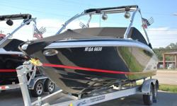 This 2011 Cobalt 232 WSS is LOADED to the gills with virtually every option you could possible get on a Cobalt. It comes with a factory wake tower, tower bimini top, (2) tower speakers, amp, sub, tower mirror, wakeboard racks, walk through transom, snap
