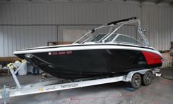 This 2013 Cobalt 232 WSS is LOADED to the gills with virtually every option you could possible get on a Cobalt. It comes with a factory wake tower, tower bimini top, tower board racks, walk through transom, snap in carpet and snap on covers (not shown in