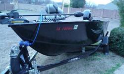 2013 Lowe Fishing Machine 165 Pro Series bass boat. It has every available option available from Cabellas. Boat, motor, and trailer is in as new condition, not a scratch. Motor is a mercury 90 horse 4-stroke. Boat has been put in the water twice and has