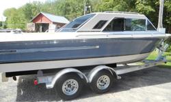 Original Condition one owner boat. Hoisted its entire life. Bilge is spotless. Chrome, upholstery, and hull are in excellent condition. GM/MERCRUISER V8 454/340HP. Full waterline cover. All records since new. Brand new aluminum trailer available. Delivery