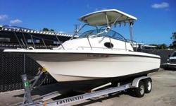 This is an excellent rough water boat which is fish ready. Comes complete with her own Tandem Wheel Trailer. She is powered by a 200 hp Yamaha two stroke outboard motor. She will accomodate two in her roomy cuddy cabin with fresh water sink and Port-a-