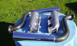 From a 1974 Thunderbolt Eliminator with a 455 Oldsmobile. One of the manifolds have an ear broke off, But can be fixed. I do not have the ear. Both the stacks and manifolds have all the nipples in them, In terrific condition. The Stacks and Baffles them