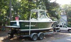 2004 Trophy 2352 Walkaround The 2352 WA is a sterndrive powered fishboat with many standard features, good seating room for fishermen, and cabin which comes in handy for naps, getting out of the sun, or simply for all your gear. Key Features
Cabin with