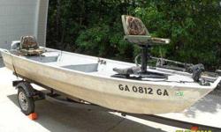 14Ft. Jon Boat (Mon Ark) with motors Asking $2400.00 or OBO Must see to appreciate Has Evinrude 9.5 HP, starts first pull, just service. No leaks, has live well and dry storage. New carpet. Trolling motor with new battery. Eagle fish finder. Registered