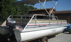 This is a 1991 18' Landau Pontoon boat. It has a 30hp Yamaha motor. Runs well. Pontoons, floor,all structures are excellent. Do not have any of the seats, and the boat lamps do not work. Loads great. New tires. Pontoons do not leak. They are in excellent