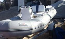 Inflatable Dingy w/ 25 HP two stroke eng - $2499 (agoura hills)1997 Avon Inflatable with center wheel. 11-feet long, with 2-stroke 25 HP Mercury engine, strong enough to pull wake boarder, great shape, new battery, new steering cable, oars, cargo