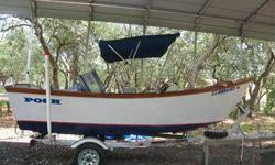 Built in 1991, this unique boat is made by POSH. It is a 16FT, well maintained, sturdy boat with a center console and hydraulic steering.Motor is a 40HP Yahama. Trailer is a Magic Tilt with good tires and bearings. It has a bimini top, brand new live bait