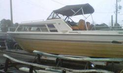 1981 Cruisers Inc. 26' cruiser powered by a great running 260hp V-8 engine system with only 208 hrs on it. The upholstery is in good condition. This clean and roomy cruiser sleeps 4, has a galley with a sink ,two burner stove, and refrigerator; head with