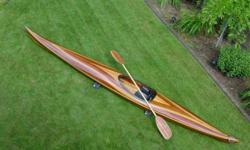 For Sale 17' Cedar strip sea kayak. Completed in Spring 2001. Water tight hatches fore and aft. Custom wooden paddle
Weighs 47#. Oneoceankayaks.com design, Expedition Sport. Used 2 times, no scratches, always kept inside the home.
Sacrifice at $2500 OBO