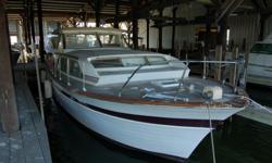 1964 CHRIS * CRAFT CONSTELLATION 37' YACHT.THIS CHRIS CRAFT HAS A LOT OF POTENTIAL AND WITH A LITTLE T.L.C. WILL BE A BEAUTIFUL BOAT.THE DONOR DID STATE THAT ONE ENGINE IS THE ORIGINAL 327 WHICH WE STARTED AND RAN FOR ABOUT 20-30 MINUTES. THE OTHER IS A
