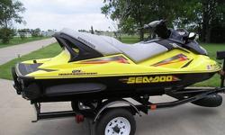 2004 SEA-DOO BOMBARDIER GTX 4-TEC SUPER-CHARGED 3-SEATER JET SKI. ADULT OWNED & RIDDEN. ABSOLUTELY PERFECT CONDITION WITH 28.2 HRS. NO BLEMS, SCRATCHES OR MARKS ON SKI OR TRAILER. JUST SERVICED BY SEA-DOO TECH.FEATURES