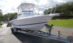 2001 Proline 250 Walk around. This boat has only 188 hours, powered with Twin Opti Max engines with hydraulic steering, mirage stainless propellers, aluminum motor brackets, custom hard top with rod holders, integrated bait well, electronics box, Raytheon