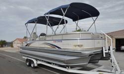 225 Horsepower Mercury Optimax Outboard. High back reclining Admiral chair. High Performance Package. Tritoon, Mercury Optimax . Woodgrain Steering Wheel. Clarion CD Stereo with 4 High Power Speakers. MP3 Input Jack. GPS with Fish Finder, GPS Speedometer