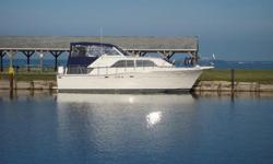 Owner anxious, try 44K. The first impression when you walk aboard is important. Even on the hard, stretch wrapped and ready for winter, this boat shows well. Now that she is back in the water it really shines. The hull is freshly waxed and looks