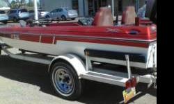 1986 Monark 70 horsepower Bass Boat... Runs good!! Has three Liv Wells.Lots of Storage Area.. Twin Fuel Tanks. Have had for four years with no Problems. Good seats..Will pull a tuber..Asking 3000 but shoot an offer.. My number is 317-7185.. New Batt also