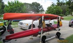 Two 2008 Hobie Adventure Kayaks...purchased new in 2010 from Economy Tackle with 2010 turbo drives. Includes two 16' kayaks, two paddles, two kayak life vests, dry bags, rolling PVC storage rack for two kayaks. Also truck trailer hitch T bar for