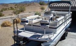 2005 Fisher Pontoon. 24 ', 60 hp, 4 stroke Bigfoot, 2 batt, fish finder, GPS, portapotti, sink, Brand new AM/FM CD player, life vests, B.B.Q., xtra prop, Bimini, live well, cover for pontoon. This boat has no sun damage. In awesome condition for 2005.