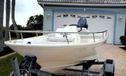 You are viewing a beautiful 1998 13ft(13.9) 6ft. wide beam Boston Whaler Dauntless in outstanding condition.It is powered with a 1998 Yamaha 50 pro tilt and trim less than 100 hours.Also included is a 2002 heavy duty performance trailer with 13inch