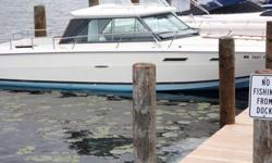 24 ft Searay hardtop sedan, stand-up head (bathroom), 350 cubic inches Merc outdrive motor, comes with a trailer.