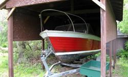 22' former blue fishing restoration project with Chrysler 250. Great fishing barge. Last in water over a decade ago in Long Island Sound in CT and has been under roof in photo since. Galvanized NorEaster tandem trailer with spare galvanized wheel was in