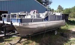 comes with 2 motors 1st is 25 hp mercury and the 2nd is 40 hp evinrude both run well like new blue carpet painted outside blue good condition fits 12 people or more has a running live well boat trailer in good condition contact Terry Stevens if interested