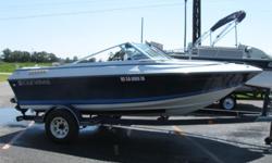 1987 Four Winns 160 Freedom Bowrider powered by a Mercruiser 3.0L Sterndrive engine. This bowrider features bowseating with storage, captains seat, fold down lounge seat, and transom bolster seating convertable into sunpad. Options include