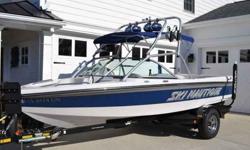 2007 Nautique 206 SKI NAUTIQUE 2007 Nautique 206 Ski, beautiful white hull with blue stripe, Tower, Racks, Tower Speakers, Keyless Ignition, Tournament love seat, Perfect Pass, 150 hours on the fuel injection PCM engine, CD Stereo, and a single axle